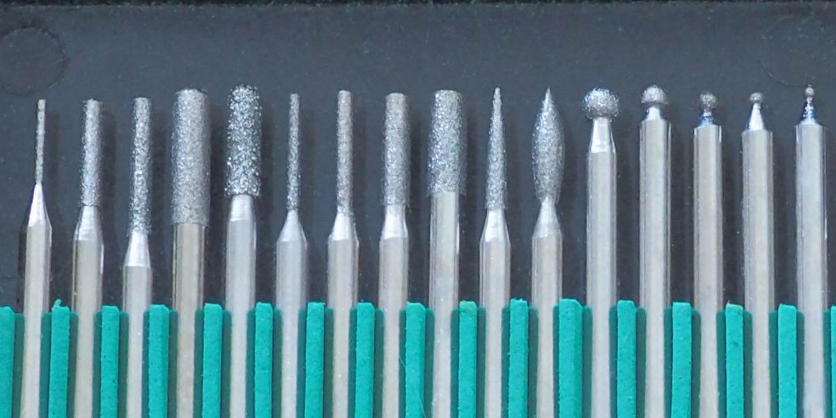 ชุดเจียเพรช ชุดเจียงาน ดอกเจีย หัวเจีย ดอกกัด ดอกเจีย ชุดแกะสลัก หัวเพรช ทำงานหินได้ด้วย Dimond burrs dremel tools accessories2