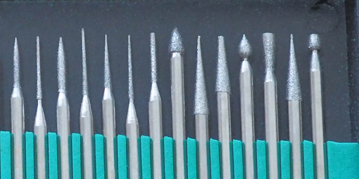 ชุดเจียเพรช ชุดเจียงาน ดอกเจีย หัวเจีย ดอกกัด ดอกเจีย ชุดแกะสลัก หัวเพรช ทำงานหินได้ด้วย Dimond burrs dremel tools accessories1