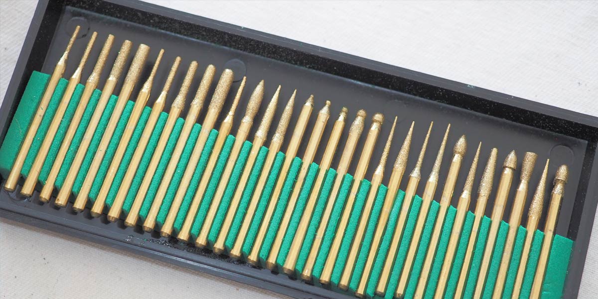 ชุดเจียไทเทเนียม ชุดเจียงาน ดอกเจีย หัวเจีย ดอกกัด ดอกเจีย ชุดแกะสลัก หัวไทเทเนียม ทำงานหินได้ด้วย Titanium burrs dremel tools accessories1